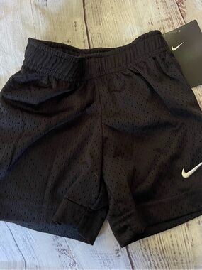 Nike Black Mesh Kids Athletic Shorts with White Swoosh